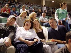 Photo of CSUCI alumni Chris Byhoffer ‘06 and family at a baseball game