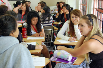 Photo of EOP students chatting in a classroom.