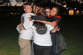 Photo of EOP students in a group hug.