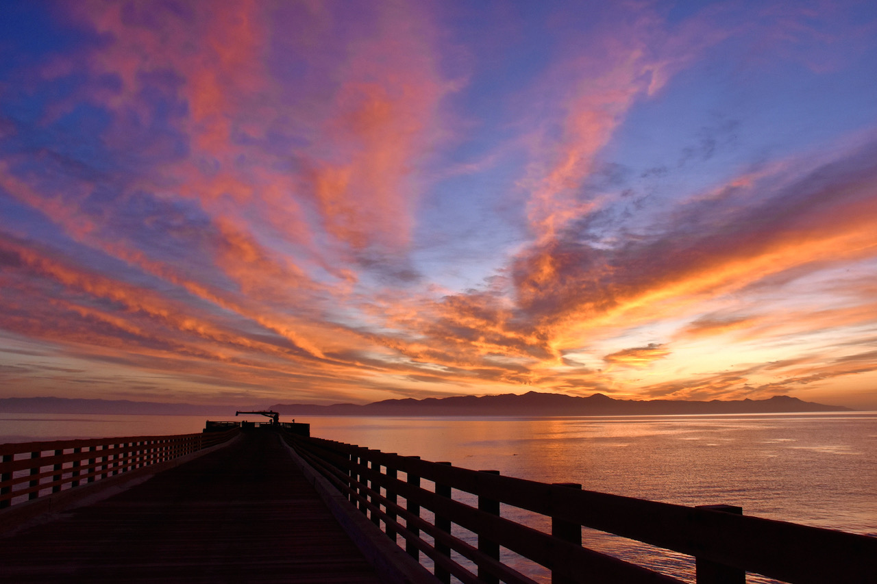 Landscape view of Santa Cruz Island, the ocean, and Santa Rosa Island pier