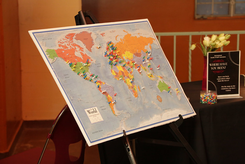 Map of the world with pins indicating places visited by attendees of reception