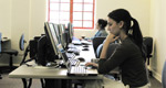 Student on computer in Technology Center 1972, PC Lab