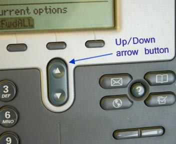 The up and down arrow button is located bellow the four buttons below the display screen.