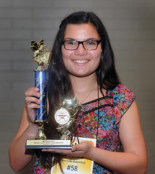 Soleil Jones holds her trophy