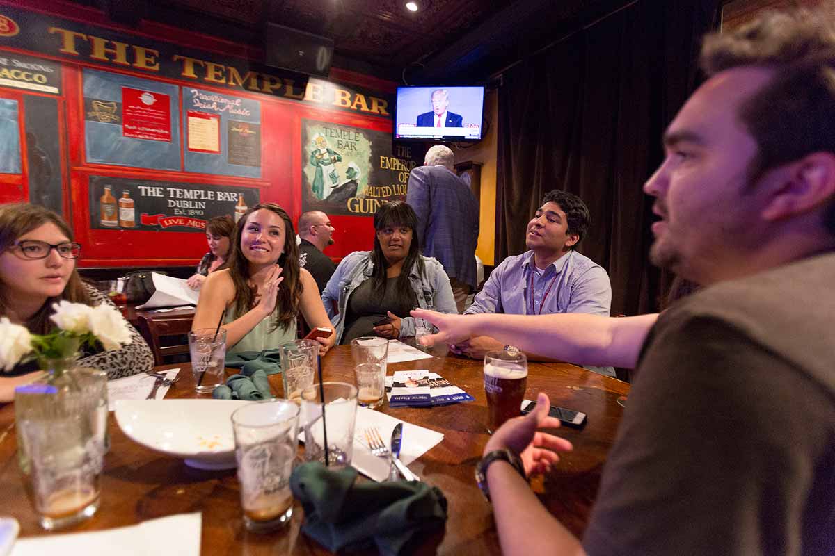 CI Republicans talk and tweet during a viewing party for a Republican debate.