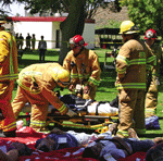 Fire fighters help victims as the University hosts countywide disaster drill
