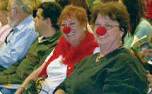 patch adams fans showing their clown side with red noses