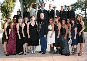 president rush and students gather together at annual dinner party