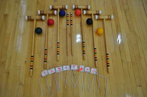 Croquet set with mallets, wickets, and balls