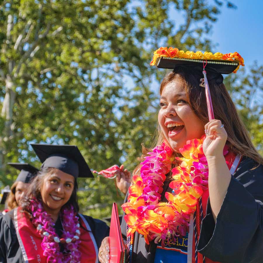 Smiling CSUCI graduating woman during convocation