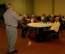 older people listening to a lecture