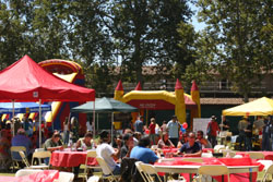 boucy house among club tables in south quad 