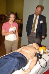 Alumna Evelyn Lelonek '06 and B&TP Mentor Greg Hayward (Over the Net) learn about nursing technology