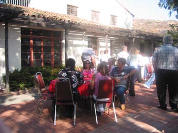 Group of alumni sitting at a table