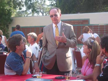 President Rush talking to some alumni