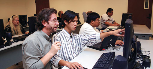 Professor Geoff Dougherty instructing a student