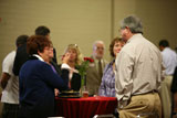 Audience eats during pre-presentation mixer