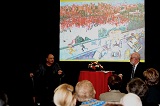 Cheech Marin shows a piece from personal Chicano Art collection.