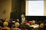 Audience listens intently as Mr. Kelkar answers audience questions.