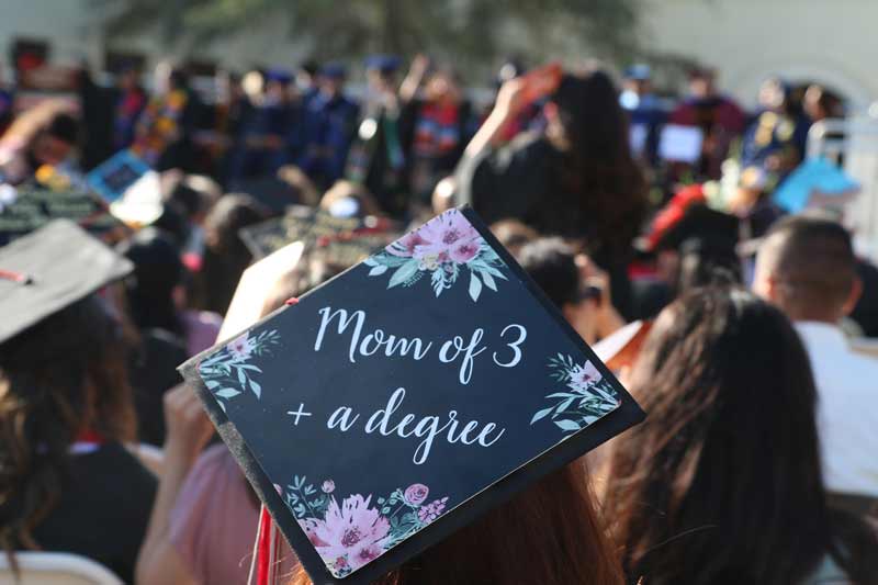 Mom of 3 plus a degree graduation cap