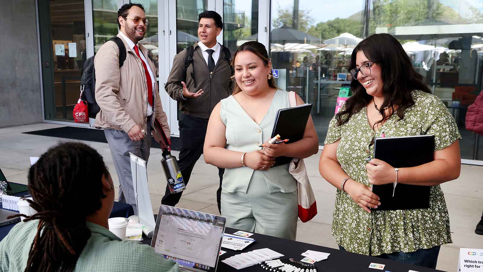 Ladies interacting with a person