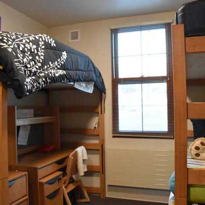 Each Triple Bedroom has 1 lofted bed & 2 bunked beds