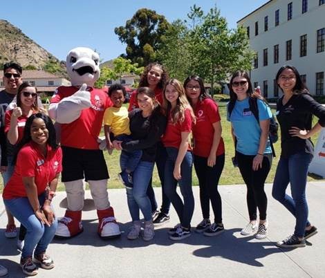 Our amazing Student Assistants and Ekho helping out with our annual Admitted Dolphin Day.