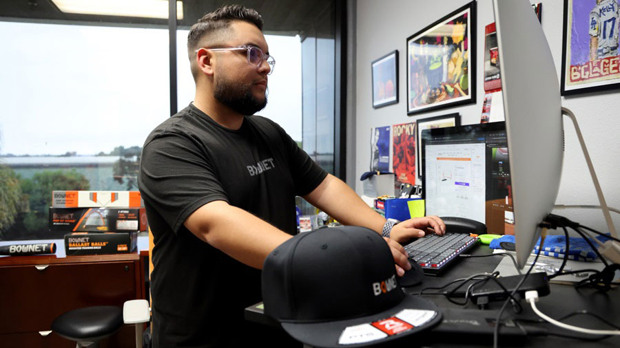 Bautista working at his desk
