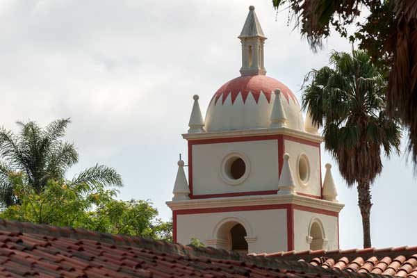 Top of a building tower in spanish style architecture 