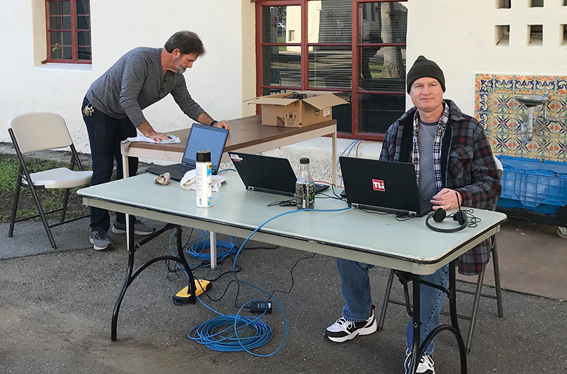 Chris Murphy and Dale Velador prep computers