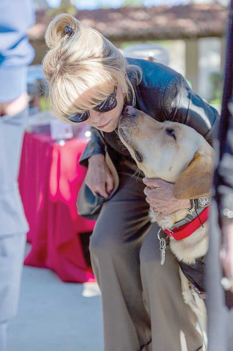 Elizabeth Rice Grossman and Doc  share a moment.