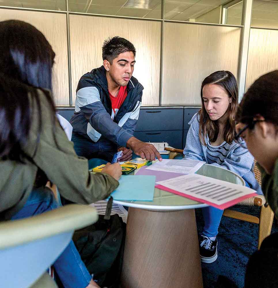 Peer mentors work in a group