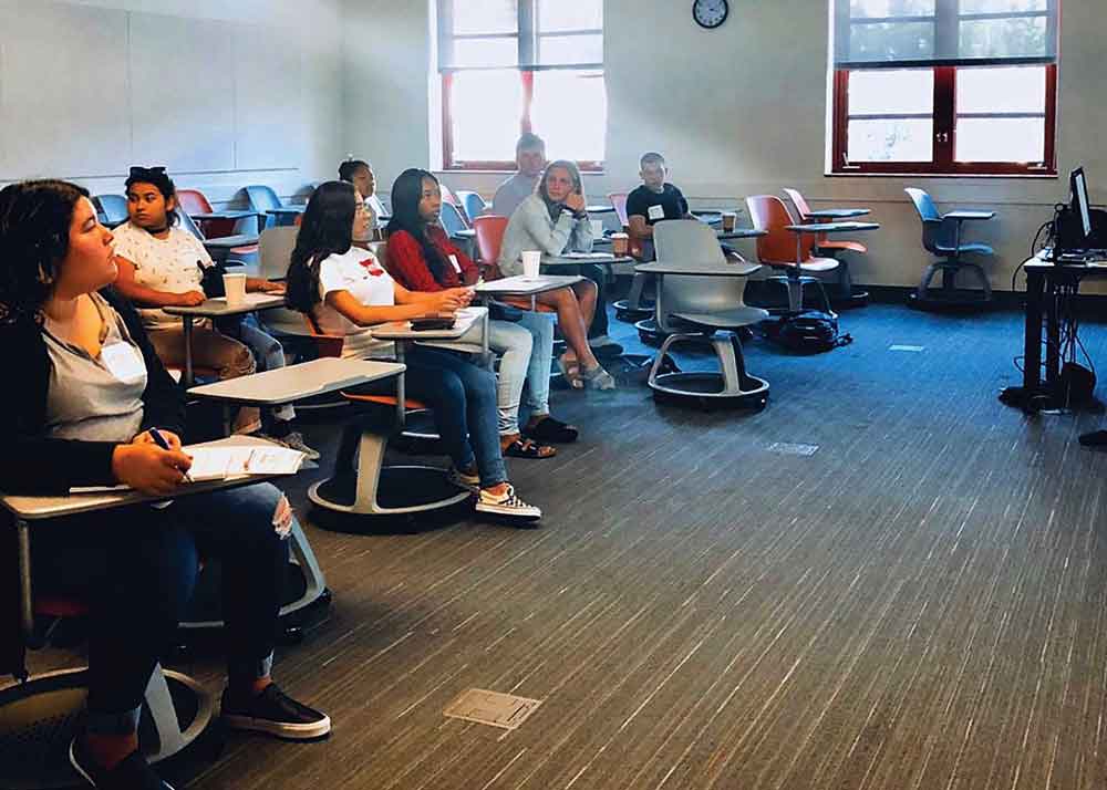 Students listen to instruction at the boot camp