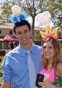 Festival goers with balloon wearables