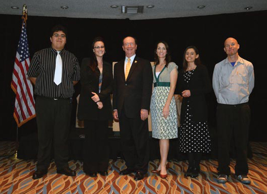 Scholarship recipients Eric Varela, Jenna Fordis, President Rush, Christy Diggins-Richey, Ashley Tegley, Charles Hillman Scholarship recipients with President Rush