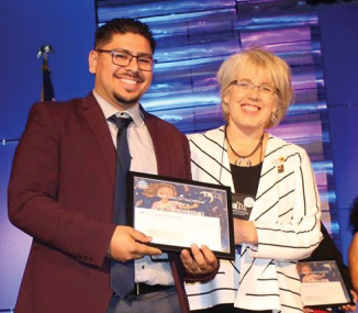 Victor Rodriguez accepting Peter Chacon Teachership Award