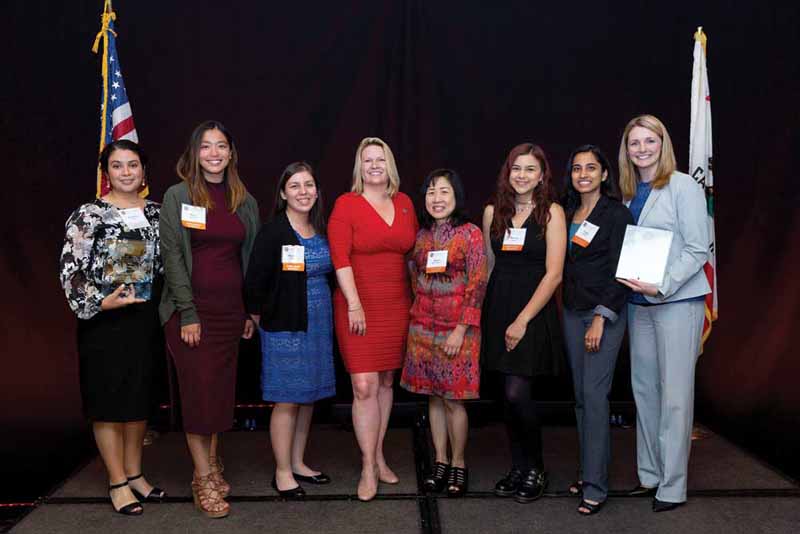 From left: Assistant Professor Cynthia Flores, Deanne Antonio, Devina Chavez, President Erika Beck, Anna Maria Sandry, Melony LaBoy, Tanya Saxena and Alison Perry Bauerlein of Inogen