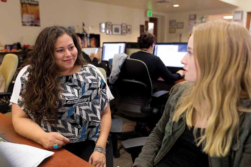 Amanda Quintero advises a student.