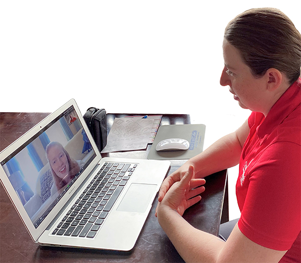 LEFT TO RIGHT  Shannon Allen (seen on the laptop) and Gabrielle Pittle (at the desk)