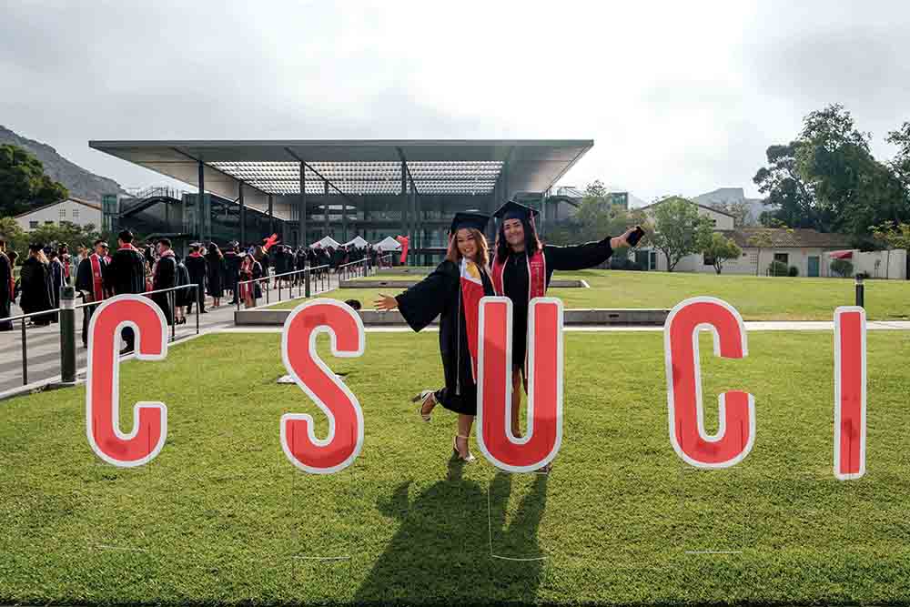 Students pose at Commencement