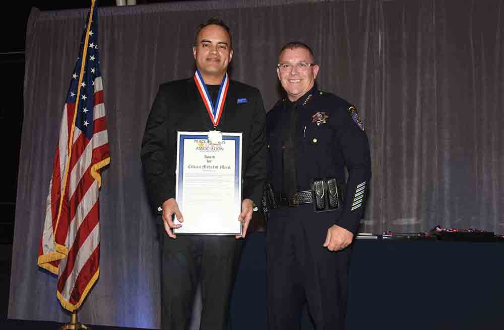  left to right: Indy Valencia and CSUCI Interim Chief of Police Drake Massey.