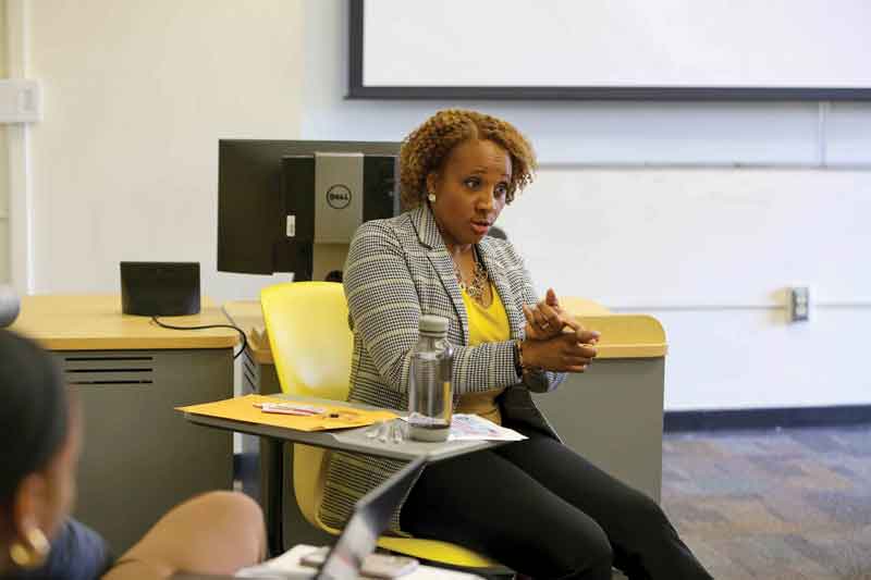  Assistant Professor of Communication Katherine Elder speaks to the class. 