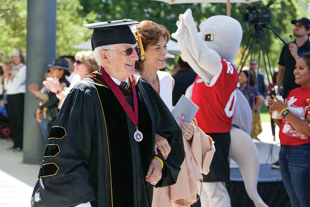 President Emeritus J. Handel Evans and Carol Evans attend President Yao’s Investiture ceremony.