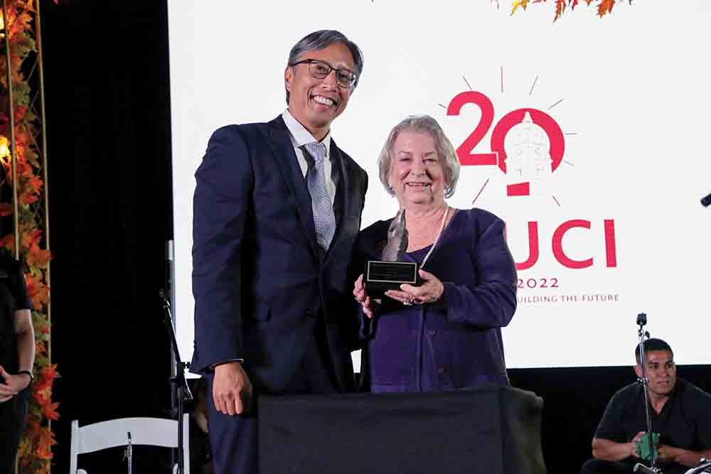 President Richard Yao presents Leah Lacayo with the 2022 Robert J. Lagomarsino award. 