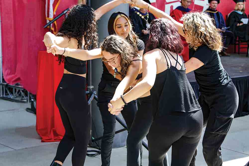 LEFT TO RIGHT Alumna Melina Ortega and students Isabella Roberts, Stephanie Oregel, Gabriella Perry and Andrea Lopez dance during President Yao’s Investiture.