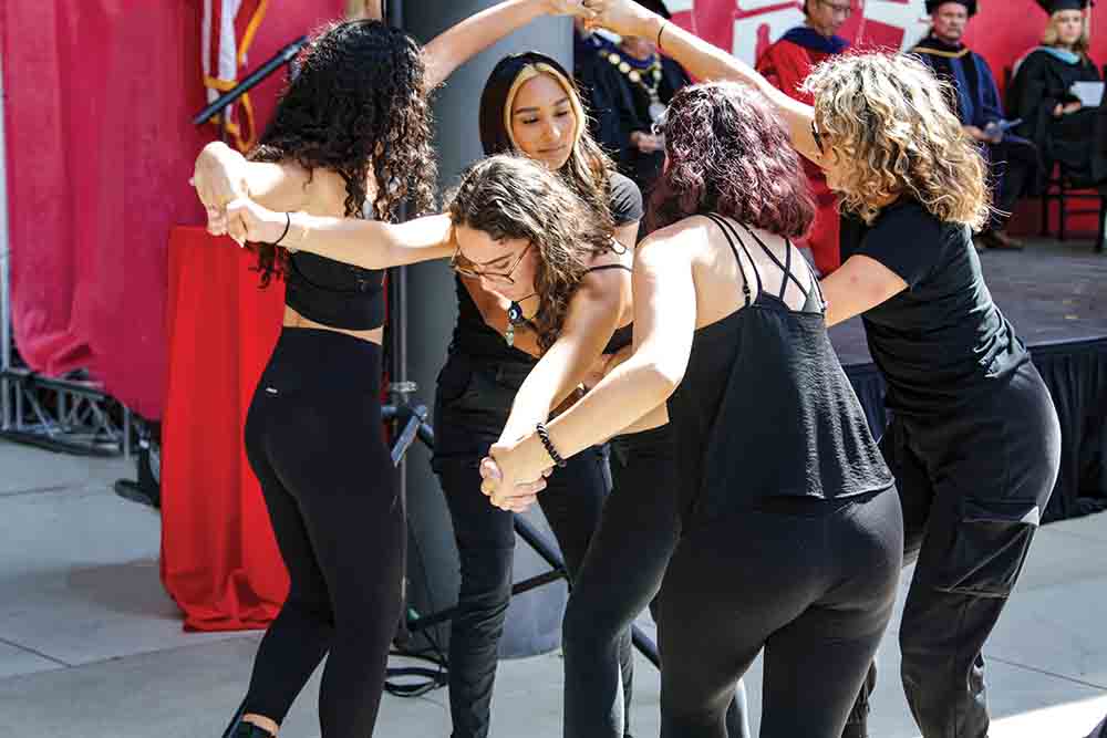 LEFT TO RIGHT Alumna Melina Ortega and students Isabella Roberts, Stephanie Oregel, Gabriella Perry and Andrea Lopez dance during President Yao’s Investiture. LEFT TO RIGHT Alumna Melina Ortega and students Isabella Roberts, Stephanie Oregel, Gabriella Perry and Andrea Lopez dance during President Yao’s Investiture.