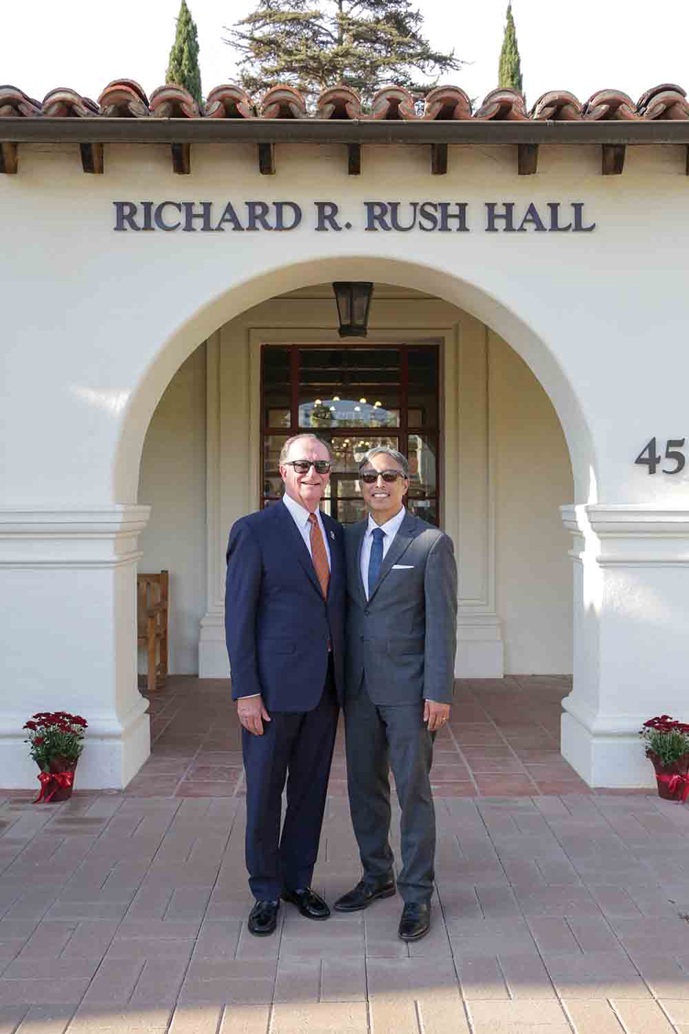 CSUCI President Emeritus Richard Rush (left) and President Richard Yao stand before Richard R. Rush Hall.