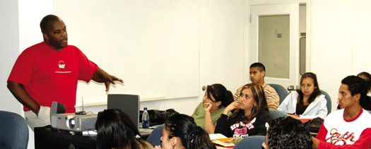 Virgil Adams teaches a group of students