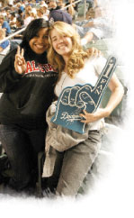 Students Brenda Cubias and Meagan Popiel show their spirit at dodger stadium