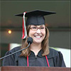 student at podium behind microphone